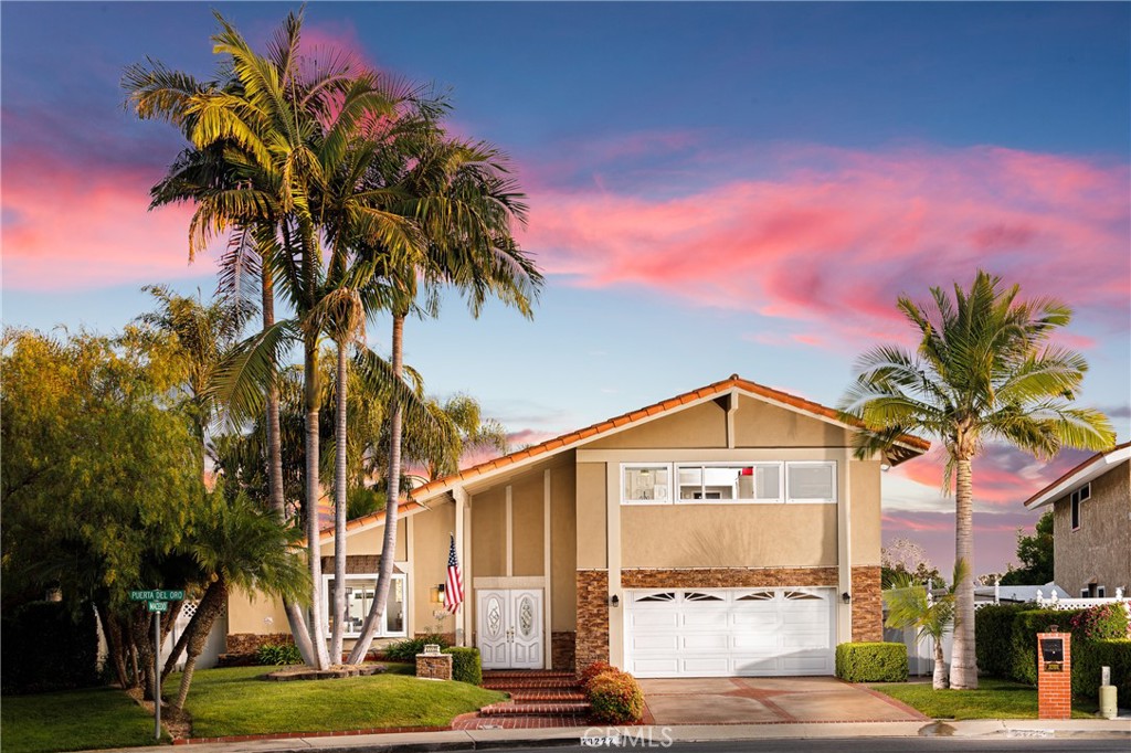DISCOVER THE BEST OF MISSION VIEJO LIVING! This 3-bedroom (+ Huge Sunroom), 2.5-bath home sits on a spectacular 13,600 sq. ft. lot, offering an impressive backyard, city lights view, and a spacious layout that blends comfort and flexibility. Located in the sought-after La Paz Central neighborhood, this property is a true standout for buyers seeking space, style, and indoor-outdoor flow. The heart of the home features beautiful finishes in the living room, dining room, family room, and kitchen. A versatile sunroom adds nearly endless potential—use it as a another living area, game room, office, gym, or creative space. Upstairs, the primary suite offers a calm retreat with custom finishes, including a walk-in shower, custom vanity, and dressing area. Each room is filled with light and thoughtfully designed to maximize space and comfort. Outside, you'll find the showstopper: a resort-style backyard with a sparkling pool and spa, mature tropical foliage, covered patio, lighting, a charming gazebo with firepit, and a terrace balcony for evening views. There’s even room for a possible ADU or casita addition—rare for the area. Additional features include Newer HVAC System (2020), New Water Heater (2024), ample recessed lighting, dual pane windows, double-door entry, vaulted ceilings, and over-sized 2 1/2 car garage. No HOA Dues! But, this extraordinary home also offers the option for Lake Mission Viejo privileges. NO Mello Roos Tax and all within walking distance to award-winning schools, shopping, dining, and scenic trails. A rare opportunity to own a premium property with room to live, grow, and entertain. Schedule your tour today—homes like this don’t come along very often!