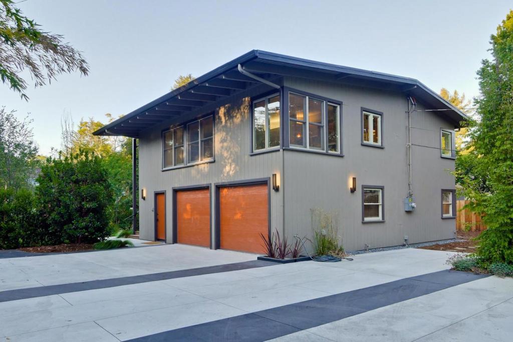 Completely remodeled 2 yrs ago. Very private setting, large lot, New: roof, hydronic heating, light fixtures, dual pane windows, landscaping, painting. 2 bonus rooms can be used as bedrooms, elevator, 2 master bedroom suites, 2 partial bathrooms, Menlo Park Schools, natural light, built in barbeque grill, great home for entertaining, open floor plan, peaceful yard setting. Minutes to 101, Facebook, downtown Palo Alto. 500 additional square feet in ground level of house. Must See.