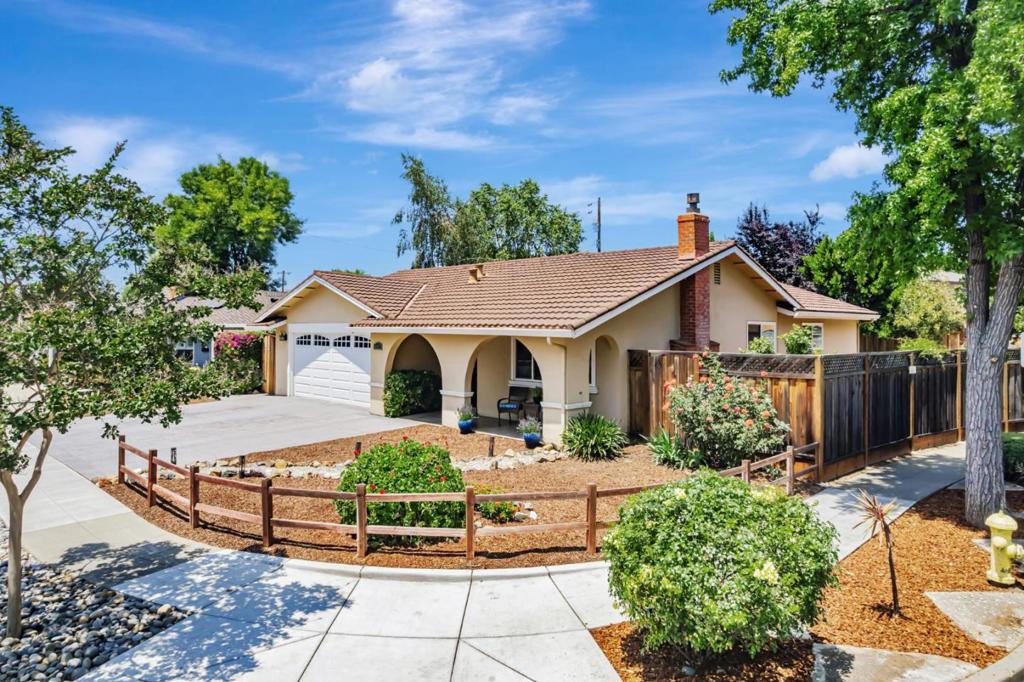 Charming 4-bedroom Cambrian home on a spacious corner lot in a lovely cul-de-sac! Enjoy great curb appeal & unobstructed views of greenspace. With approximately $220k in updates, the home is tastefully updated with elegant, hand-scraped hardwood floors and stylish decor throughout. The updated kitchen shines with Taj Mahal quartzite counters and backsplash, stainless steel appliances, and gas range. Outdoor living is just as inviting, featuring a deck and a stamped concrete patio perfect for relaxing or entertaining. The side yard offers versatile access. The unique shape of the lot allows for potential construction of an ADU with separate access (verify with the city). Additional features include: mature landscaping with fruit-bearing trees; remodeled bathrooms with stone counters and a large soaking tub; extra-large stamped concrete driveway accommodating three vehicles; central A/C; a high-end gas fireplace with remote control for year-round comfort; storage shed for extra convenience; and updated electrical panels that are ready for your EV and hot tub. This home is excellently located near Almaden Ranch, Costco, Oakridge Mall, and Highway 85, ensuring easy access to shopping and commuting. Don't miss this rare opportunity to grow your dreams in such a desirable neighborhood!
