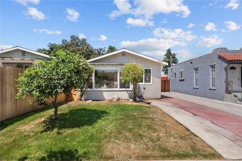 Photo of 3705 S St Andrews Pl, Los Angeles, CA 90018 (MLS # OC26053263)