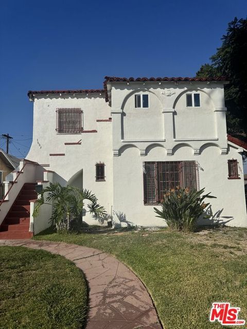 Photo of 1601 W 69th Street, Los Angeles, CA 90047 (MLS # 25609221)