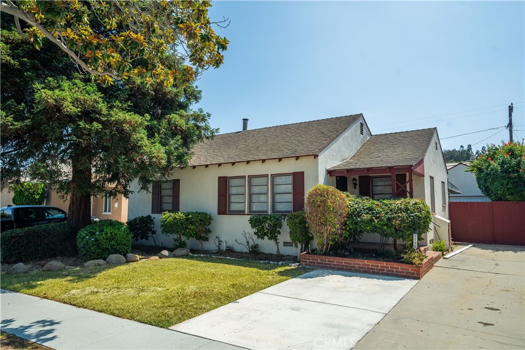 Welcome home to this well maintained 4-bedroom, 1-bath home with a huge yard and a detached two car garage in the heart of Artcraft Manor. The home includes permits ready-to-issue (RTI) plans to add two units and convert the main house into a 3 bed, 2 bath layout! The second unit which replaces the garage has 1-bedroom and 1-bathroom, and the third unit is a 2-bedroom, 2-bathroom unit. An owner occupant would also potentially have the ability to complete an SB-9 lot split to separate the front home from the two proposed back units, significantly increasing the potential for return on the investment into the construction.
The current home has new wood grained luxury vinyl tile throughout the living areas, and new black and white checkered tile in the bathroom and kitchen. The kitchen includes a 4-burner gas stove-oven combo, with washer and dryer. The kitchen and bathroom also include new cabinets with quartz countertops. The windows have horizontal blinds throughout.
Artcraft Manor is just North of the traffic circle and the local area has highly rated public schools and lots of shopping and dining options. The neighborhood is very walkable and bikable while also being one of the quieter pockets of Long Beach. For work and commuting the property is less than 1 mile from the 405 freeway, for relaxation and recreation, you’re less than 3 miles to the beach and ~5 miles to downtown Long Beach’s attractions and waterfront.