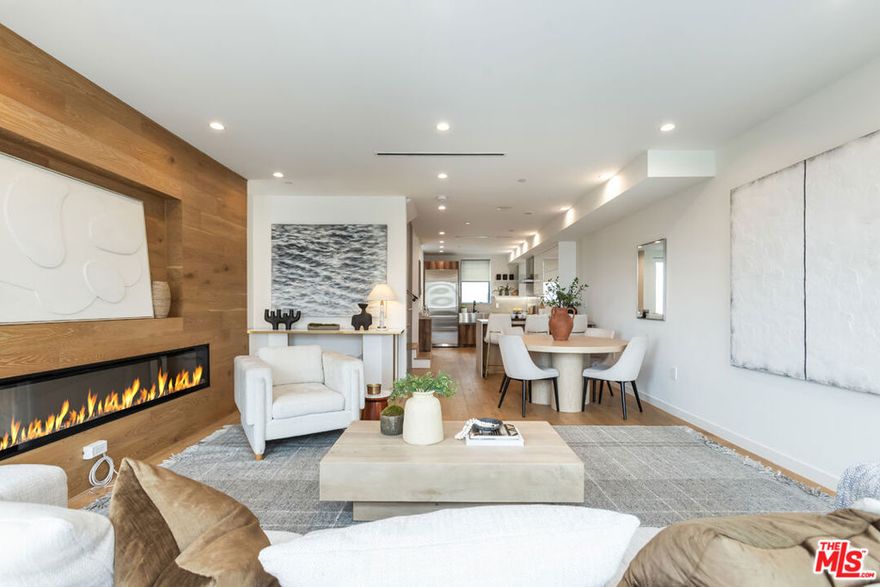Modern elegance meets effortless living in this newer construction, multi-level home perched in the heart of prime West LA. Bathed in natural light all day thanks to its south-facing orientation, the home offers sweeping, unobstructed views of the Santa Monica Mountains, Getty Center, and skyline all the way to Hollywood.Every inch of this smart, stylish residence is thoughtfully designed. All bedrooms include private en-suite baths, and high-end upgrades are found throughoutHansgrohe fixtures, a chef's kitchen with Sub-Zero, Wolf, and Miele appliances, touchless faucet, automated cabinetry, and a concealed pantry. A fully integrated Hi-Fi audio system spans every level, including the rooftop, while two-layer automated blinds, color-adjustable LED lighting, and a central iPad hub control it all with ease.The primary suite spans an entire level with four closets, a built-in 94-inch vanity. A flexible fourth bedroom downstairs is perfect for a gym or guest room, while the upper-level secondary suite doubles as an ideal WFH space with two walk-in closets, laundry hookups, and a hidden safety room. The living area features a dramatic wood-paneled media wall and a 100-inch digital fireplace with heating and cooling functions.Up top, a private rooftop deck with built-in gas and water lines, integrated TV wall, and optional utility sink creates an entertainer's dream with views for days. The EV-ready garage and premium smart-home finishes complete the package.Just minutes from Sawtelle, Japantown, major markets, the beach, and Beverly Hills, this is turnkey, tech-savvy Westside living with a view. Property is also listed for sale at $1,699,000