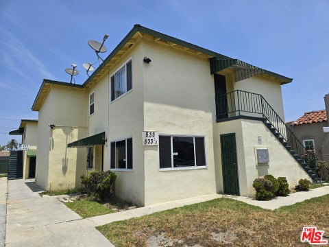 Photo of 533 W 77th Street, Los Angeles, CA 90044 (MLS # 26927475)