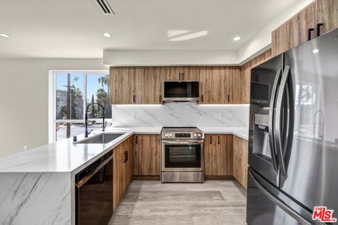 Photo of 1305 N Sycamore Avenue #1/2, Los Angeles, CA 90028 (MLS # 26866971)