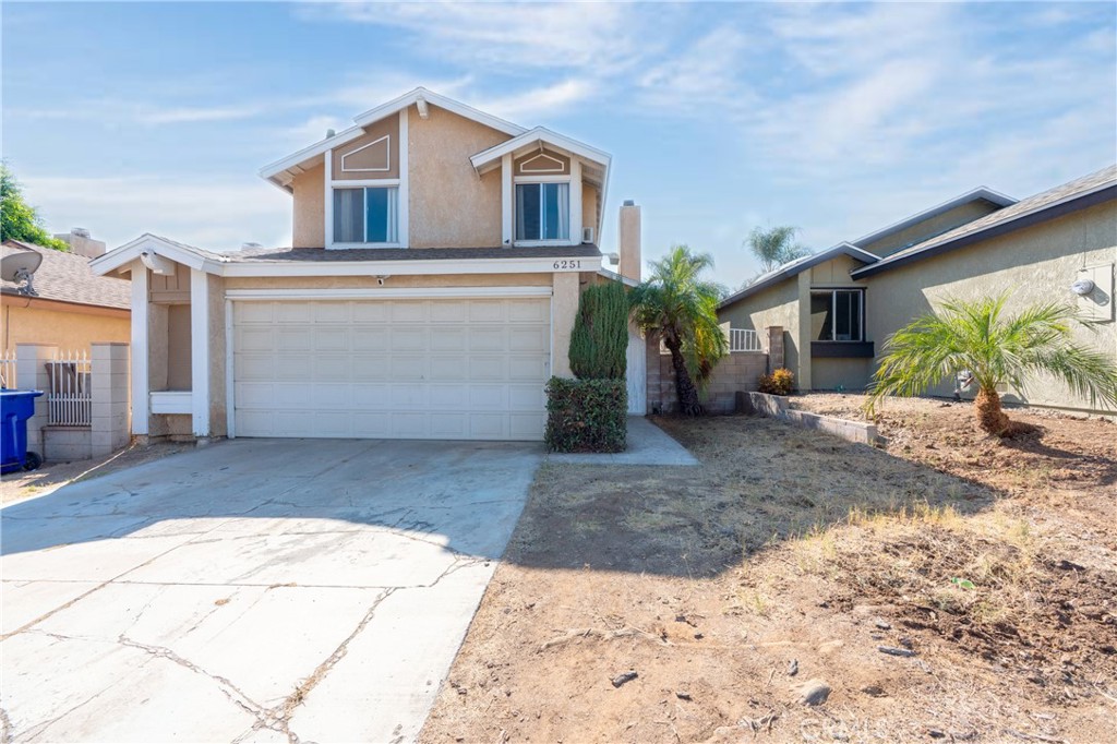 This two-story single-family home offers 3 bedrooms and 2.5 bathrooms across approximately 1,554 sq ft of living space. Located in a quiet residential neighborhood of Jurupa Valley, the property sits on a 3,485 sq ft lot and presents a great opportunity for buyers looking to add value through renovation.
The home features a functional layout with high ceilings and a spacious living area. An office space has been added on the first floor without permits.
The kitchen and bathrooms are in original condition. The backyard includes a covered patio and stamped concrete, offering a solid foundation for outdoor improvements.