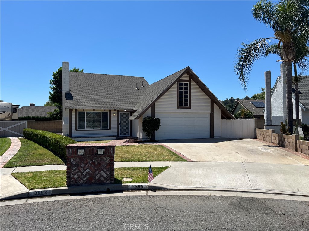 Charming 3 bedroom, 2 bath home in Anaheim located in a sought after neighborhood across the across the street from Yorba Regional Park! All 3 bedrooms are on the 1st floor and there is a huge open loft on the 2nd floor. Features include vaulted ceilings, track lighting, living room with fireplace, two car garage with direct access and a private backyard with fruit trees. Wonderful location near top rated schools, parks, walking trails, dining, entertainment, shopping and more! Owner pays for gardener. Small pet under 25 pounds will be considered. No smoking on premises. Renter's insurance is required. Available immediately.