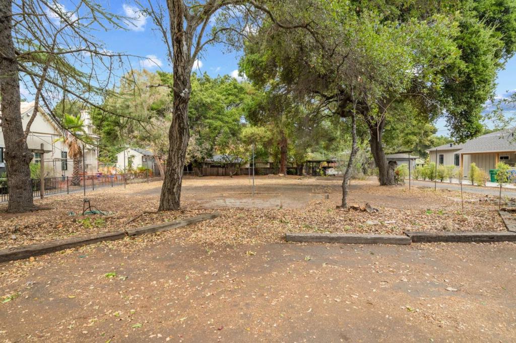 Once in a lifetime opportunity to build your dream home in one of Los Gatos' most desirable neighborhoods, surrounded by multimillion-dollar estates and nestled in a serene setting. This remarkable offering includes two flat parcels totaling approx. 77,000 sq ft, just a short stroll from top rated Los Gatos schools. The location balances the best of both worlds: the charm and serenity of a countryside setting with the convenience of being just minutes from vibrant downtown. Held by the same family for over 50 years, this property is ready to become your legacy estate. Zoned R1-8, check with the Town of Los Gatos Planning Department for potential customization development. The 50,590 sq ft lot includes existing structures, while the adjacent approx. 27,600 sq ft lot (APN 529-20-15) is vacant and potentially sold separately. Parcel APN 529-20-016 is also for sale as ML81987720 under residential for the 50,590 sq ft parcel listed at $4,748,000. Parcel APN 529-20-015 is also for sale as ML81987716 under lots and land for the 27,600 sq ft lot listed at $3,250,000. Don't miss your chance to build your dream home in this extraordinary location! Access to the property is on Pine Ave only.