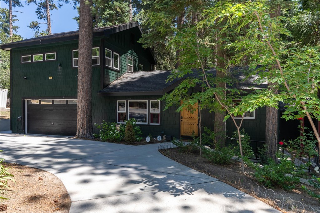 This home is truly set up for Mountain Living in the modern era. Considered the newest, most thoughtfully constructed residence in Angelus Oaks. Built and personally occupied by a commercial general contractor with over 30 years of experience, quality craftsmanship is evident throughout. Situated on a rare double-wide lot on one of the widest streets in town, the home features double-pane windows, upgraded insulation, a 2022 roof, solid-core doors, and a fully finished garage. Top-tier infrastructure includes a 200-amp panel, 20kw Kohler generator, EV charger, 500-gallon propane tank, 2 tankless water heaters, copper plumbing, and a modern septic system. With HVAC throughout and a mini split in the lower level. Interior highlights include two en-suite bathrooms with commercial-grade toilets, dual laundry hookups, an extra-wide staircase, and a luxurious master suite with forest views, a walk-in closet, and built-in surround sound. Outdoors, enjoy a 460 sq. ft. covered living space with a propane BBQ grill directly connected to the propane line, pergola-ready slab for a hot tub, RV parking with sewer hookup, and His & Hers (2) electrically powered sheds. Thoughtful details inside and out, this move-in-ready retreat offers space, comfort, and the rare opportunity to enjoy nature without sacrificing convenience.