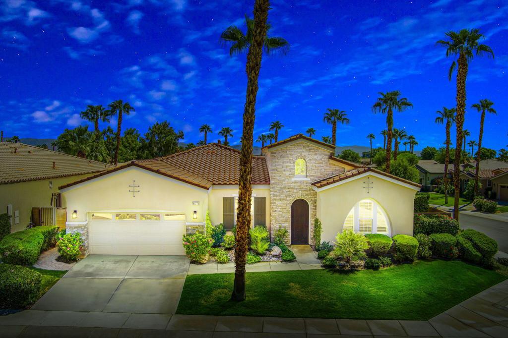This stunning Talea model 2,524 SQ FT Trilogy home offers $120,000 in new luxury finishes. More photos coming soon. Truly exceptional, the home has 3 bedrooms, 3 full baths, a formal dining room, great room with fireplace, a primary bedroom retreat with sumptuous bath, and a bonus room. Outside, the professionally landscaped private yard features a raised firepit, two covered patios, and SW mountain views from inside and outside the kitchen, great room, patio, and side yard. Two, newer A/C units, plantation shutters, indoor Solar Shades, and new automated patio Solar Screen keep the home cool and energy efficient. Open and spacious, the home is bright and freshly painted with 10'ceilings, crown molding, tiled floors in the main living areas, and new carpet in the three bedrooms and bonus room. Smart and inspired, the spacious gourmet kitchen boasts all new custom white soft-close cabinets many with pull-outs, polished quartz countertops, new sinks, and faucets. A Pro stainless six-burner gas cooktop with custom range hood, and stainless oven, microwave, dishwasher, and refrigerator make cooking for one, or many, an absolute pleasure. Guests will love the large separate entertainment island with a wet bar, a beverage center and seating for five. The large primary bedroom retreat has a view to the backyard, new carpet, and French doors to the private covered back patio. A generous walk-in closet with custom built-ins and lighting, and a separate mirrored wall closet accommodate all your clothing and accessories. The sumptuous primary bath radiates with new white dual vanities, topped with dreamy quartz, new sinks, premium delta faucets, upgraded vanity mirrors, and lighting. The new frameless glass shower enclosure, tiled shower floor, and lighting are clean and fresh. End your day with a soothing soak in the large spa-like tub. Tucked away is a bonus room that's perfect as an office, fitness, or craft room. Guests will love the two spacious ensuite bedrooms, closets, and full baths. Enjoy the private backyard and zen-like garden with a beautiful sculpture and lemon tree. Two covered patios offer multiple dining and resting areas. A fire-pit for cool nights and solar shades and fans for warmer days, give comfort to outdoor living.