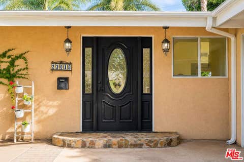 Photo of 23018 Bigler Street, Woodland Hills, CA 91364 (MLS # 26842913)