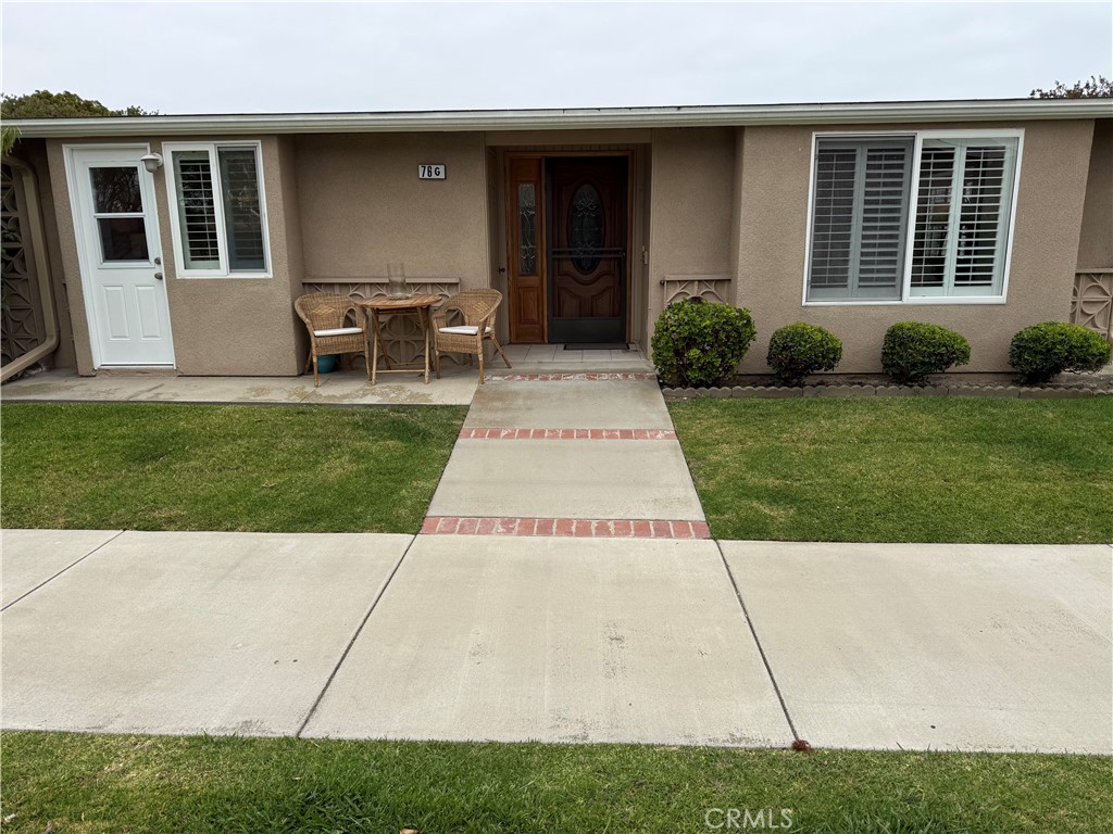 This fully expanded 2 bedroom 1 1/2 bathroom corner home with dining room has many upgraded features. The leaded glass front door leads to an entry that features a walk-in entry closet, a spacious living room and dining area. The living room has double pane windows, an extended front window that has a window seat with storage, built-in bookshelves on each side, and a ceiling fan. The kitchen has custom wood cabinets, built-in appliances including a dishwasher, skylight, added pantry, and ceiling fan. The main bedroom has double pane windows, separate entry door, ceiling fan, and walk-in closet. The main bathroom has a custom shower with sliding door entry, custom cabinets, recessed lighting, washer/dryer, and tile flooring. The second bedroom has double pane windows, sliding glass mirrored wardrobe closet doors, ceiling fan and 1/2 bath with tile flooring. This ready to move-in home has central heat and air conditioning, double pane windows, plantation shutters throughout and has been newly painted. It is located in the resort-like community of Leisure World Seal Beach.