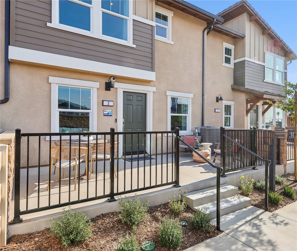 NEW CONSTRUCTION - NEW COMMUNITY! Welcome to Dahlia at Sierra Vista, a brand-new townhome community located in a gated community in the city of Fontana, featuring a community pool and play lot. Dahlia at Sierra Vista offers two-story townhomes ranging from 1,584 to 1,705 sq. ft. with up to 4 bedrooms and 2.5 bathrooms. This Residence 1584 plan features 3 Bedrooms and 2.5 Baths, a spacious open-concept Great Room, Kitchen and Dining Area designed for gathering and perfect for entertaining friends and family. The gourmet Kitchen offers stainless-steel appliances including cooktop, dishwasher, and microwave/hood and beautiful cabinetry and kitchen countertops. The second level features a thoughtfully-designed layout, offering a spacious Loft, Bedrooms, convenient Laundry Room and large Primary Bedroom and Bathroom with walk-in shower and closet. Among the features and finishes, homeowners will appreciate the unparalleled peace of mind in owning America’s Smart Home, Home is Connected. The Home is Connected package offers devices conveniently controlled from one application to stay connected to home around the clock.