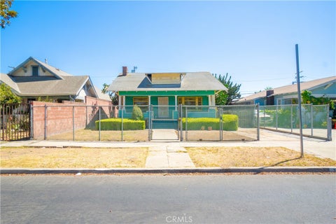 Photo of 1430 W 51st ST, Los Angeles, CA 90062 (MLS # SB26168646)