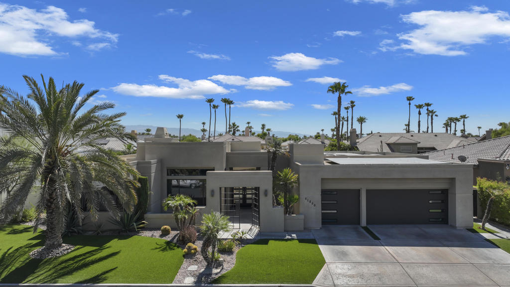 This is a must-see.Private secured entry walk-way lead to double doors and a welcoming foyer.This open floorplan with front door and all interior doors 8 feet highCeilings are coffered and 10 to 13 feet high.All furniture and appliances are top-of-the-line.Kitchen is remodeled with stainless appliances, double ovens and slab granite counter tops.Family room off of kitchen with wet bar.Formal dining room and living room with floor to ceiling marble fireplace.Large master suite with walk-in closet.2 other guest suites with full baths.Separate private office and a den overlooking a dream patio with relaxing pool, spa, built-in BBQ, fire pit, decorative lighting and an awning the width of the patio.New A C, 3 car garage, the best in SOLAR and everything else you could want for.