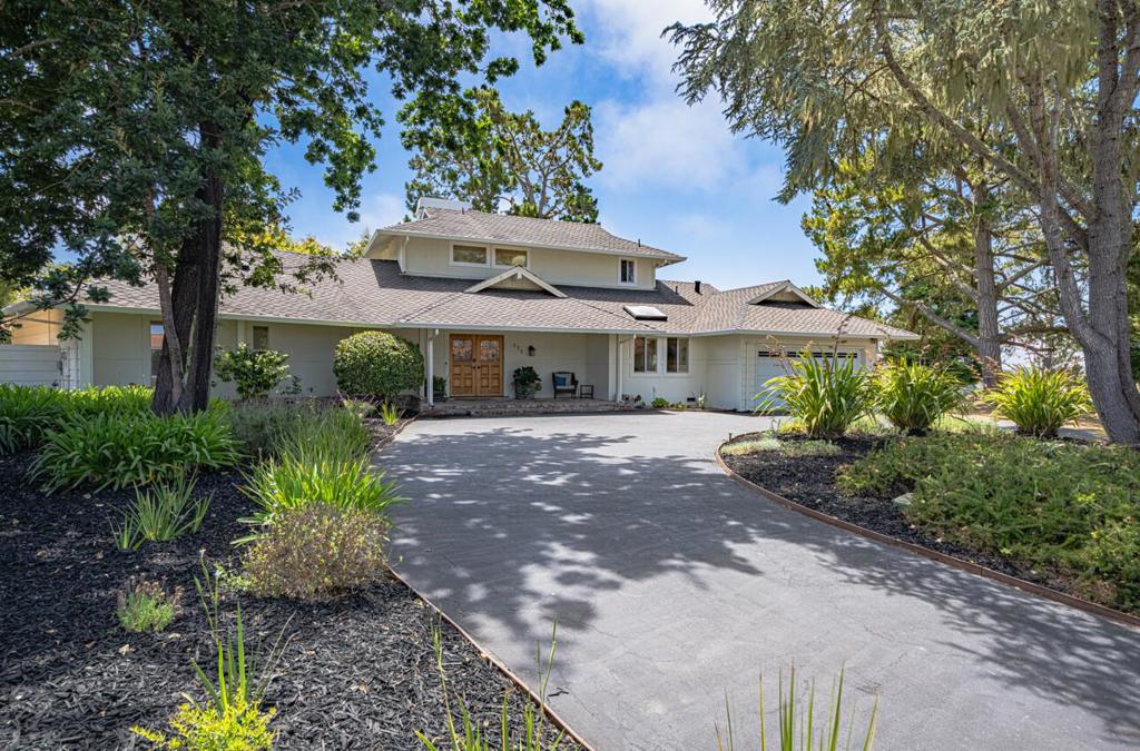 Set at the end of a quiet cul-de-sac and nestled on over a quarter acre lot along the 14th fairway of Seascape Golf Course, this residence blends spacious comfort with refined elegance. Just a half mile from miles of pristine sandy beaches, and blocks from the highly regarded Rio Del Mar Elementary School, the location is both idyllic and convenient. The home's thoughtful and timeless floor plan is designed for both grand entertaining and quiet, everyday living. It features generous gathering spaces alongside intimate retreats. A ground-floor primary suite offers easy single-level living, while the upstairs suite is a true show stopper boasting panoramic golf course vistas, peeks of the ocean, and a spa-inspired bathroom. Recent interior upgrades include: new HVAC and ductwork, freshly painted interior, new tankless hot water heater, completely updated plumbing for the primary bathroom, instant hot water and new kitchen sink fixtures and appliances. Exterior features include a large wrap-around deck perfect for outdoor entertaining, new exterior water system including drip irrigation, solar panels, fruit trees, berry bushes, raised garden beds and a circular driveway with ample parking and so much more. You don't want to miss this beautiful home.