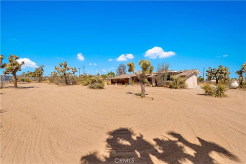 Photo of 58662 Buena Vista Drive, Yucca Valley, CA 92284 (MLS # JT26196325)