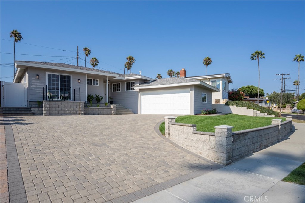 Welcome to your next chapter in one of San Pedro’s most sought-after neighborhoods — South Shores. This newly renovated, fully turnkey residence is competitively priced to offer exceptional value without compromise. Step inside to a layout that flows with light, openness, and a sense of arrival. With 3 bedrooms, 2.5 bathrooms, and thoughtfully designed living spaces, every detail has been elevated. The Venetian plaster fireplace creates a stunning focal point, while luxury vinyl plank flooring and a 12-foot accordion slider erase the boundary between indoors and out, letting the ocean breeze flow through.
The custom kitchen cabinetry, high-end stainless steel appliances, and wine fridge set the stage for both daily living and memorable entertaining. A restored rare Cinderella bathtub nods to the home’s character, while partial ocean and Catalina views and a deck off the primary suite invite moments of coastal serenity. Other notable features include a 200-amp electrical panel, new front lawn perfect for kids or pets, and ethernet outlets in every room for both EMF-conscious living and lightning-fast connectivity. This exquisitely designed home showcases beauty, comfort, and longevity and is ready for you to move right in and start living the lifestyle you’ve imagined.