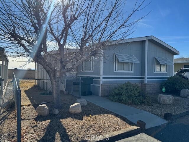 Welcome to Whispering Hills! This well-maintained 3 bedroom, 2 full bathroom mobile home is located in a peaceful and pet-friendly park in the Rosamond community. Enjoy an open and comfortable layout, perfect for both relaxing and entertaining. Home includes a washer, dryer, refrigerator, and a convenient storage shed for all your extras. The yard features automatic sprinklers for easy maintenance.
Whispering Hills offers fantastic community amenities including a sparkling pool, clubhouse, basketball court, and a playground—something for everyone in the family to enjoy. Don’t miss your chance to own a home in this quiet and welcoming neighborhood!