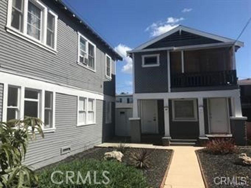 Great Location! This beautiful 2 bedroom, 1 bathroom unit with a is located in the well sought out neighborhood of near downtown. It is a ground floor unit that has one common wall. Upon entry you will notice refinished floors throughout. The entire unit has been refurbised. The kitchen has newer cabinets and granite counter tops. The kitchen comes with a stove and built-in microwave and refrigerator. The unit features fresh paint throughout and a lot of windows giving a good light and breeze. This unit puts you in walking distance of the beach, downtown, and other featured landmarks. It is also conveniently located near shops and restaurants. This unit is part of a duplex that is upgraded, well-kept inside out and will offer an on-site coin operated laundry.