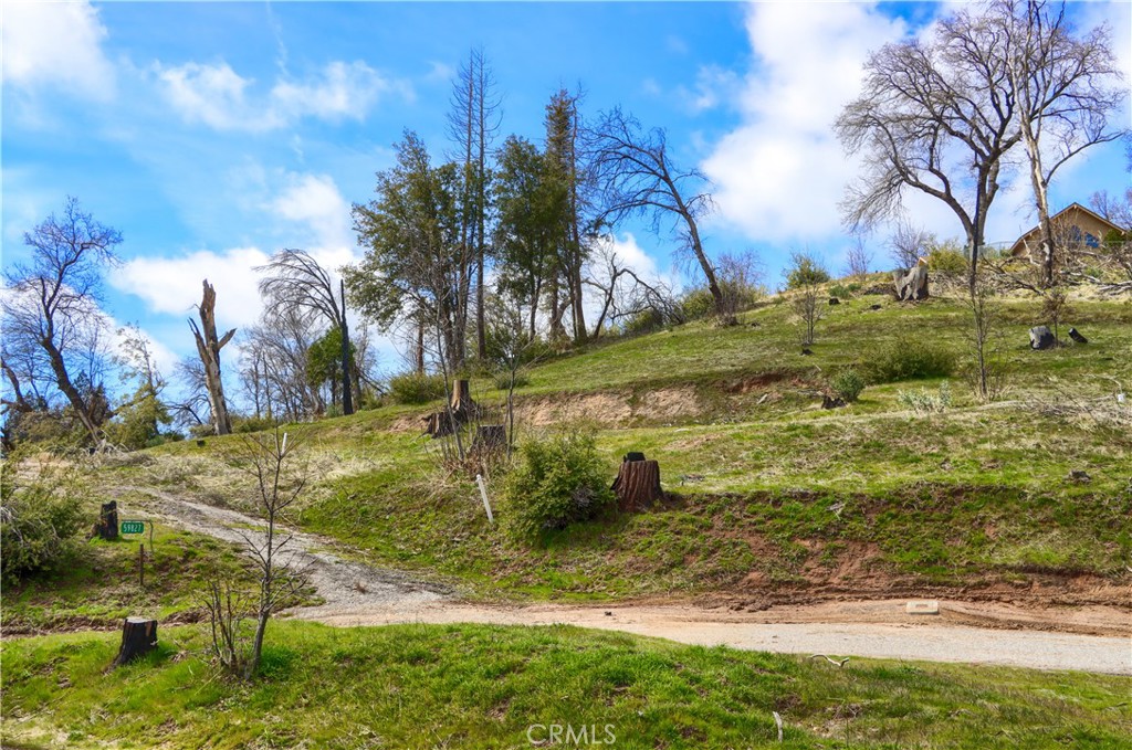 Located in the beautiful Cascadel Woods subdivision, this acre of privacy is at the end of a cul de sac where you can see and hear the rustle of Whiskey Creek. Much of the property has already been cleared, there is an existing driveway, a pad for a home which can easily be expanded, and if that isn’t enough, there is a certified septic system, a power pole on the property and it is on public water. No one will ever build across from you or block your view, as there is forestry land all the way down to the creek. This property is one of a kind. Come take a look – you won’t be disappointed.