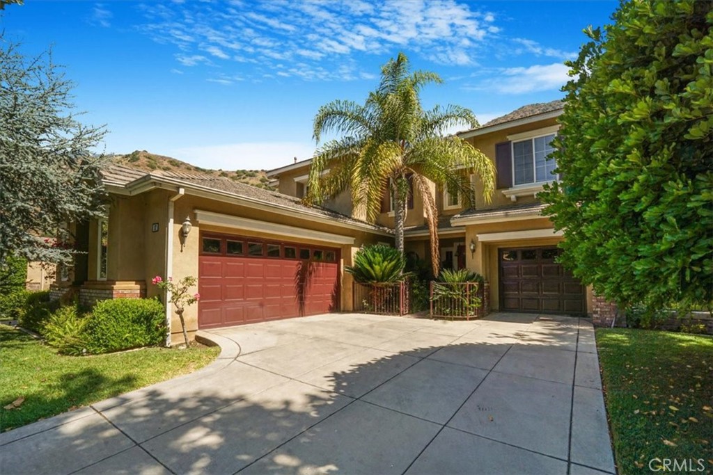 Your Dream Home Awaits in the Majestic Mountain Cove Community
Welcome to one of the most sought-after gated communities in Azusa Hills—Majestic Mountain Cove—where nature, comfort, and convenience come together in perfect harmony. This is your rare opportunity to own a beautifully maintained home in a serene and private setting surrounded by mountain views and natural beauty.
This stunning residence offers 2,648 sq. ft. of well-designed living space, featuring 3 spacious bedrooms, 2 bathrooms, hardwood flooring, and recessed lighting throughout. Every detail has been thoughtfully designed to create a warm, inviting atmosphere perfect for both everyday living and entertaining.
Step outside to a generous backyard oasis, ideal for relaxing, barbecuing, or simply taking in some of the most breathtaking sunsets in the area. The property is located in one of the best spots within the community, surrounded by well-kept gardens and lush greenery.
Residents of Mountain Cove enjoy resort-style amenities, including a clubhouse, sparkling pool and spa, playground, park, scenic walking/jogging trails, and 24-hour security patrol. Outdoor enthusiasts will love the direct access to the San Gabriel River Bike Trail, Wilderness Park, nearby hiking trails, and a short drive to Crystal Lake.
Conveniently located near the 210 and 605 Freeways, Metrolink station, shopping centers, and entertainment venues, this home offers the perfect blend of privacy and accessibility. It’s truly a rare find in one of Azusa’s most picturesque communities.
Don't miss your chance to call this peaceful retreat your home.