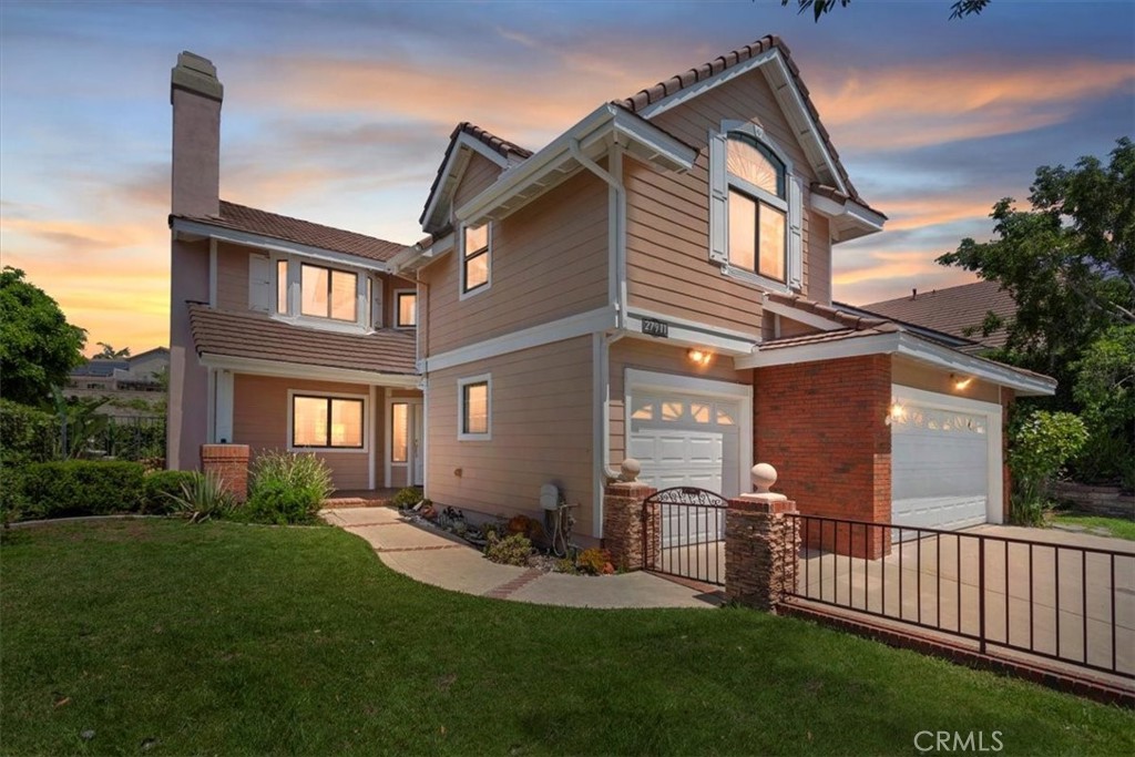 Incredible Opportunity in Mission Viejo! Welcome to 27911 Sheffield — a spacious 4-bedroom, 3-bathroom home offering 2,360 sq ft of living space and unlimited potential in one of South Orange County’s most beloved communities.
Set on a quiet interior street, this property features a well-designed floorplan with vaulted ceilings, formal entry, and a main-floor bedroom with adjacent full bath — ideal for guests or multi-gen living. The kitchen opens to a casual dining area and family room with fireplace, while separate formal living and dining spaces offer flexibility for entertaining.
Upstairs, the oversized primary suite features vaulted ceilings, a private balcony, dual-sink vanity, soaking tub, and large walk-in closet. Two additional bedrooms and a full bath complete the upper level.
Enjoy access to Lake Mission Viejo HOA, where members can take advantage of year-round amenities like boating, paddleboarding, fishing, swimming, private beaches, picnic areas, and lakeside concerts under the stars. The lake also hosts movie nights, holiday events, clubhouse rentals, and summer camps — creating a true resort-style lifestyle right in your neighborhood.
Surrounded by scenic parks, walking trails, and a strong sense of community pride, this location is ideal for families and investors alike. Zoned for award-winning schools: Philip J. Reilly Elementary, Newhart Middle School, and Capistrano Valley High School — all known for their academic excellence.
Additional highlights include an indoor laundry room, 3-car garage, and a low-maintenance backyard with covered patio and side yard space. Whether you’re looking to build sweat equity or restore this home to its full potential, this is your chance to own in one of Mission Viejo’s most sought-after neighborhoods.