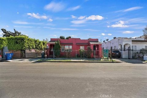 Photo of 1174 W 38th St, Los Angeles, CA 90037 (MLS # OC26039916)