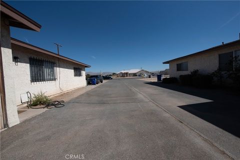 Photo of 12212 Kiowa Rd, Apple Valley, CA 92308 (MLS # WS26033967)