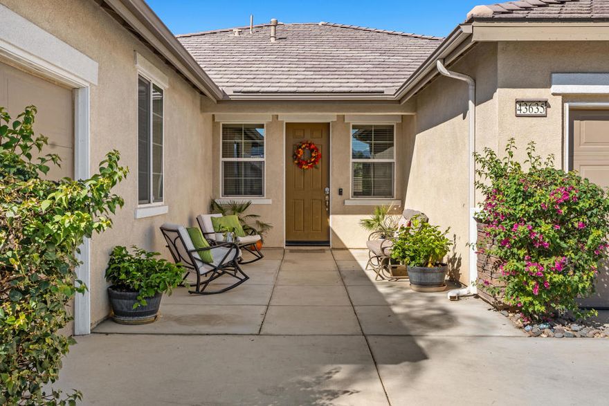 Picture yourself in this spacious five bedroom, four bathroom home in the securely gated community of Aliante in North Indio. Experience the perfect fusion of luxury, comfort, and convenience in this property. Expansive high ceilings and an open floor plan enhance the sense of space.  Relax and unwind with five bedrooms plus a versatile bonus room for family or guests with the added convenience of four bathrooms. Stunning mountain views with  low HOA fees and zero Mello-Roos taxes make this affordable luxury living. Chef-inspired kitchen with granite countertops and stainless steel appliances Elegant fireplace to add warmth and sophistication. Convenient walk-in pantry and spacious covered patio for outdoor leisureEasy-care artificial turf ensures a beautiful yard throughout the year. Engage in recreational activities at the community park equipped with basketball courts, soccer field, and play areas Prime location with nearby shopping and dining; everything you need is within reach. Effortless access to the I-10 freeway for convenient commuting. This home also equipped with solar panels (production payments range $90-$130 month per month!) Perfect for family life or investment opportunities.