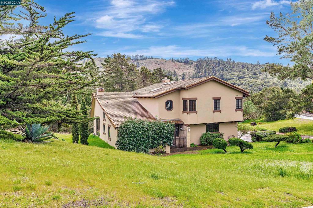 Exceptional European Inspired Estate with Stunning Views in York Hills Estates, Monterey. Experience tranquility and breathtaking views in this beautiful European estate-style property nestled in the serene hills above Monterey. Designed to seamlessly integrate the landscape, this home offers captivating vistas from every room. Property Highlights: - *Location: Set in the exclusive York Hills Estates, overlooking the picturesque Monterey Peninsula. - *Size: 2,700 square feet featuring three spacious bedrooms and two bathrooms. - *Bedrooms: Two large bedrooms downstairs with private sliders to the outdoors; one includes a charming loft. - *Studio Space: Bright studio with vaulted ceilings and skylights, perfect for showcasing art or entertaining. - *Office: Dedicated office space with three large windows and backyard access. - *Primary Suite: Upstairs primary bedroom with a nursery or walk-in closet, offering stunning views to the West and Northwest. - *Living Areas:Kitchen and living room on the upper level provide panoramic vistas, complemented by a covered deck with easy access to the backyard. - *Outdoor Space: Situated on 2.58 acres of private hillside, this property offers endless possibilities for landscaping and outdoor enjoyment. Don’t miss the opportunity!