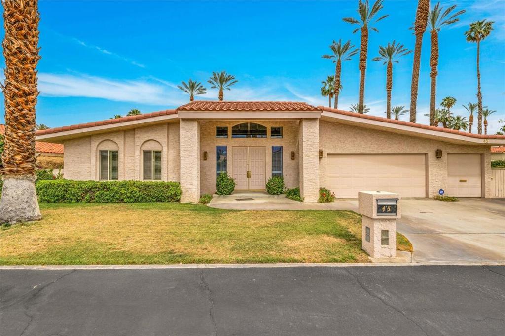 Located in the gated community of Presidential Estates in Rancho Mirage, this beautifully maintained 3BD/2.5BA contemporary home offers luxury, comfort, and low HOA fees. Situated on a private interior lot, it features soaring cathedral ceilings, an open floor plan, and a spacious living room with decorative fireplace and built-in wet bar. The large family room includes custom cabinetry, while the upgraded kitchen boasts granite countertops, center island, and stainless steel appliances. The oversized primary suite offers a soaking tub, walk-in shower, and generous closet space. The gorgeous backyard is designed for outdoor living with a gas fireplace, pergola-style patio covering, built-in misting system, and mature landscaping. Additional features include an indoor laundry room, two-car garage, and a separate space ideal for a golf cart, storage, or workshop. Located minutes from Rancho Mirage's Restaurant Row, this move-in ready home combines style, functionality, and a prime location.