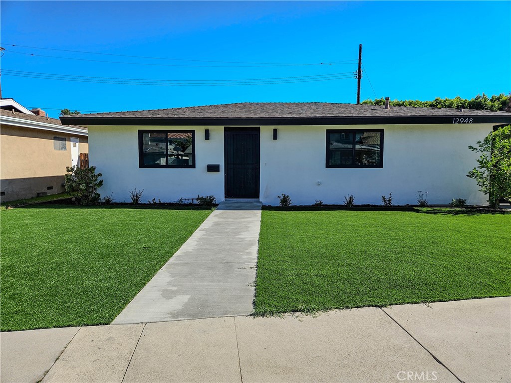 Welcome to your new home! This beautifully remodeled single-family residence in North Hollywood offers 4 spacious bedrooms and 2 bathrooms, and approximately 1,700 sq. ft. of living space. Inside, you'll find a bright open layout with brand-new flooring, recessed lighting, and fresh finishes throughout. The modern kitchen features new stainless-steel appliances, sleek countertops, and ample cabinet space. Both bathrooms are fully updated, and a washer and dryer are conveniently included. Enjoy central A/C and heat, a private backyard perfect for entertaining, and a detached garage for parking or extra storage. Located near shopping, dining, and major freeways, this home combines comfort, style, and convenience in the heart of the Valley. Don't miss the chance to make this stunning property your next home!