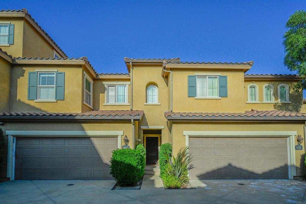 Discover this beautifully upgraded townhome in the highly desirable Del Sur community! This spacious home offers 3 bedrooms, 2.5 bathrooms, and a large private backyard perfect for entertaining or relaxing. Step inside to find elegant hardwood floors throughout, granite countertops with full backsplash, custom pull-out cabinets, crown molding, window shutters, and built-in ceiling speakers. The kitchen is equipped with stainless-steel appliances and a reverse osmosis system for convenience. Upstairs, enjoy extra storage with a custom shelf, ceiling fans in bedrooms, and a private balcony/deck. The attached 2-car garage features built-in cabinets and overhead storage. Community amenities include pools, spa, parks, clubhouse, playgrounds, and bike/jogging paths. Located within the highly rated Poway Unified School District, this home is also within walking distance to schools, parks, pools, and shopping, with easy access to I-15, SR-56, UTC, and UCSD. Additional features: Central cooling & forced-air heating Washer & dryer included Small dogs (up to 20 lbs) allowed This is a rare opportunity to own a fully upgraded townhome in Del Sur move-in ready and designed for modern living!