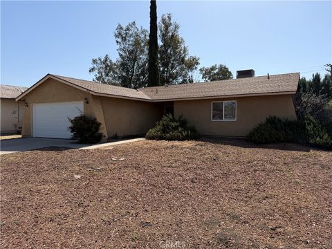 Photo of 1020 Amber Ln, Lake Elsinore, CA 92530 (MLS # IV26083223)