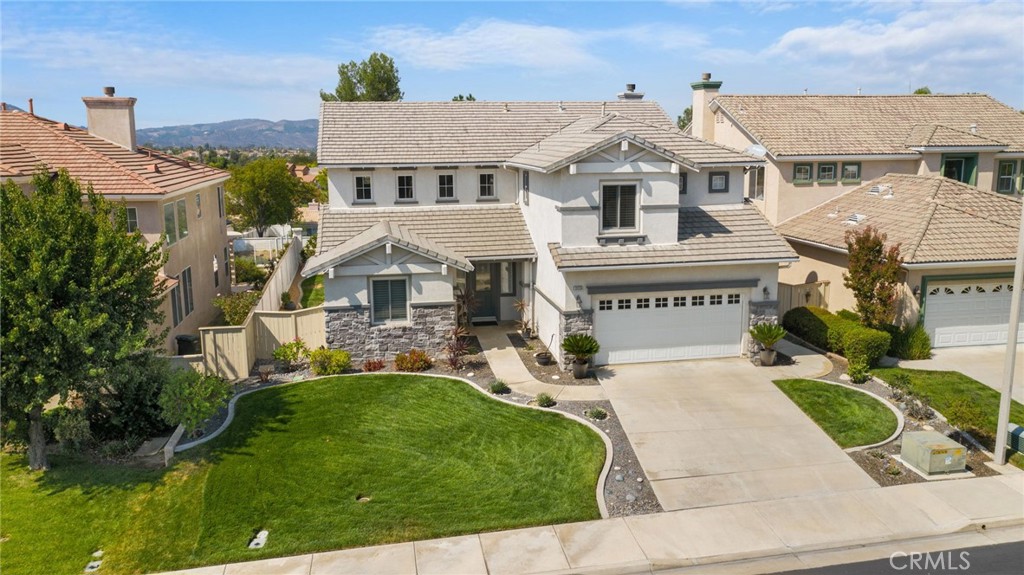 This stunning home located at prestigious gated community of Vintage in Redhawk. The home boasts 2895 sq. ft of living space on a 10,454 sq. ft elevated lot with breathtaking views of mountain and sunsets! The model-like home features 4 bedrooms plus main floor large office, 2.5 bathrooms, 3 car tandem garage, and large driveway. Main floor: an office, a formal living room with high vaulted ceiling, a formal dinning room, a gourmet kitchen with views, an eating area, avfamily room with cozy fireplace, a laundry room and a half bathroom. Upstairs: a large master bedroom with dual walk-in closet and a master bathroom, another three bedrooms and another one bathroom. A professional designed backyard with covered patio cover and grass area with beautiful plants. The home is close to schools, parks, shopping centers and trails. Highly rated Great Oak high school. Wine country is miles away. Enjoy this great home with its quality, style, views and elegance.