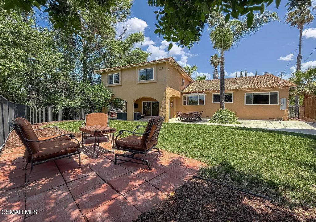 Upgraded & Spacious Santa Barbara Model with a PRIVATE Backyard Oasis in the Heart of Thousand Oaks! Welcome to 167 Siesta Avenue--a rarely available, light-filled Santa Barbara model resting on a quiet, tree-lined street within one of Thousand Oaks' most desirable neighborhoods. Featuring 4 bedrooms (easily modified to 5 bedrooms), plus loft, and 3 bathrooms, nearly 2,870 square feet of living space, and a sprawling 9,147 square foot lot, this beautifully enhanced residence blends comfort, functionality, and a layout designed for indoor-outdoor living. From the moment you arrive, the curb appeal impresses with lush, mature landscaping, vibrant garden beds, and a graceful walkway leading to the covered front porch--the perfect spot to enjoy a morning coffee beneath the shade of established greenery. Step inside to find a bright, flowing interior adorned with rich WALNUT wood flooring, crown molding, and tall dual-paned mullioned windows that flood the space with natural light. The Living Room creates a warm, elegant atmosphere with its inviting tile-surfaced gas/wood-burning fireplace, while the formal Dining Room exudes charm with wainscoting details and generous windows framing serene backyard views. For those needing flexible space, a downstairs bedroom near the entry offers the ideal work-from-home office, guest suite, or playroom, complete with windowed French doors, built-in closet, and front-facing windows. The adjacent full bathroom includes ceramic tile flooring, a built-in vanity, and standing shower. The heart of the home centers around the Family Room and bright eating nook, both overlooking the private backyard. The Family Room is media-ready with a handsome slate-surfaced fireplace, custom built-ins, and sliders that lead seamlessly outside. The adjoining Kitchen has been beautifully updated with granite countertops, stainless-steel double sink, custom cabinetry, and high-end appliances--including a GAGGENAU gas cooktop + wok burner and GAGGENAU double oven. Upstairs, the private Primary Suite offers TWO closets (including a deep walk-in), a cozy sitting nook, and abundant natural light. The remodeled en-suite bath dazzles with a granite-topped dual sink vanity, a makeup station, and a deep, fully upgraded shower wrapped in glass mosaic accents. Two spacious secondary bedrooms provide ample comfort--one boasting an OVERSIZED layout with the option to convert into two separate bedrooms thanks to dual electrical setups. A versatile loft landing makes for the perfect kids play area, gym, or second office space. Additional highlights include a fully updated hall bath with granite-topped dual sink vanity and a tiled tub/shower, an individual indoor laundry room with storage cabinetry and direct garage access, and a functional 2-car garage with built-in workbench and storage solutions. The backyard is a true PRIVATE retreat, framed by tall greenery and offering sprawling lawns, a substantial covered patio, and plenty of space for a pool or expanded outdoor entertaining area. The wide side yard, complete with 8x10 storage shed, offers incredible flexibility for a workshop, dog run, boat parking, or putting green. This peaceful enclave is prized for its proximity to Thousand Oaks' best amenities, including the renowned Wildwood Regional Park with miles of hiking and biking trails, public tennis courts, playgrounds, and sports fields. Top-rated schools--Aspen Elementary, Redwood Middle, and Thousand Oaks High--are all nearby, along with convenient shopping, dining, and quick access to the 101 and 23 freeways. Thousand Oaks is celebrated for its mild Mediterranean climate, year-round outdoor lifestyle, and abundant open space--experience the best of it all at Siesta Avenue!