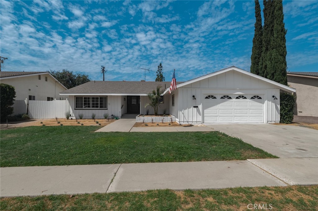 This stunning 1,737 SF home sits on a spacious 7,700 SF lot and has been completely transformed with modern upgrades and designer finishes. Featuring 3 bedrooms, 2 bathrooms, and an open-concept layout, the home boasts a brand-new kitchen with quartz countertops, a large island, floating shelves, new cabinets, stainless steel appliances, and an under-counter wine fridge. Enjoy updated bathrooms, new flooring throughout, LED lighting, a fully upgraded electrical panel, and all-new plumbing. The low-maintenance desert landscaping completes this move-in-ready home, perfectly blending style, comfort, and convenience.