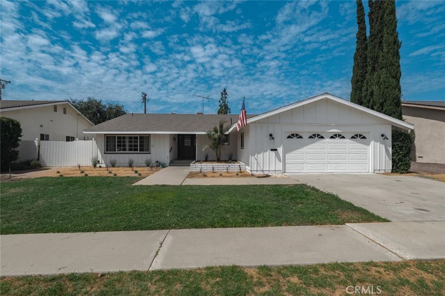 This stunning 1,737 SF home sits on a spacious 7,700 SF lot and has been completely transformed with modern upgrades and designer finishes. Featuring 3 bedrooms, 2 bathrooms, and an open-concept layout, the home boasts a brand-new kitchen with quartz countertops, a large island, floating shelves, new cabinets, stainless steel appliances, and an under-counter wine fridge. Enjoy updated bathrooms, new flooring throughout, LED lighting, a fully upgraded electrical panel, and all-new plumbing. The low-maintenance desert landscaping completes this move-in-ready home, perfectly blending style, comfort, and convenience.