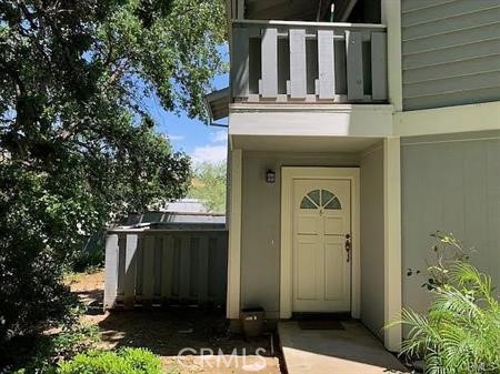 Reduced! Great location in a quiet area in the rear of the complex! Shows beautifully! Very charming! Come see this one level wonderfully upgraded end unit with two spacious bedroom suites separated by the step-down living room with fireplace and access to enclosed private patio. Many windows offer lots of light. Laminate floors throughout, except for kitchen and dining room with gleaming porcelain wood-like floors. The private two-car garage has convenient access right into the kitchen and dining room. Renovations include newer kitchen cabinets including soft-close doors, newer stove and microwave, refrigerator and washer and dryer (included in rent), 2 marble showers (one with bench), and tankless water heater. Water and trash are paid through HOA by owners. Excellent nearby schools, shopping and restaurants.