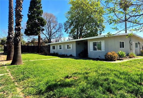 Photo of 217 E Avenue L, Calimesa, CA 92320 (MLS # IG26056297)