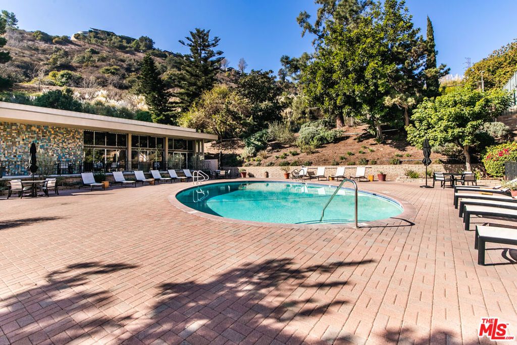 Photo of 6716 Hillpark Drive #406, Los Angeles, CA 90068 (MLS # 25565947)