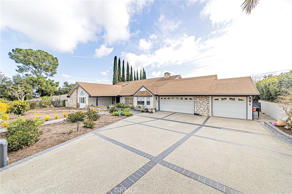 THIS GORGEOUS AND LUXURIOUS HOME, IDEALLY LOCATED IN A HIGHLY DESIRED PRESTIGIOUS NEIGHBORHOOD CLOSE TO LA AND OC, IS SITUATED AT THE
TOP OF A QUIET CUL-DE-SEC IN HACIENDA HEIGHTS COMMUNITIES. SECURITY GATED, OUTSTANDING CRAFTSMANSHIP HOME OFFER OVER 5,000 SqFt OF
LIVING SPACE WITH IMPRESSIVE OPEN FLOOR PLAN, BRIGHT NATURAL LIGHT FILLED 7 BEDROOMS, REMODELED 5 BATHS, OPEN SPACIOUS FAMILY ROOM, AND
LIVING ROOM WITH HIGH CEILINGS, BEAUTIFUL NEWER EARTH TONE HARDWOOD AND LAMINATE FLOORING THROUGHOUT. THE FORMAL DINING ROOM HAS
CUSTOM LEADED GLASS WINDOWS, AND REMODELED KITCHEN FEATURES INCLUDE A BAY WINDOW, CERAMIC TILE FLOORING, KENMORE ELITE REFRIGERATOR,
FARMHOUSE SINGLE BOWL SINK, SELF-CLOSING CABINETS AND DRAWERS, TWO PANTRIES, KITCHEN ISLAND WITH GORGEOUS BLUE GRANITE COUNTERTOP,
STUNNING WOLF 8 BURNER STOVE WITH DOUBLE OVEN FOR PROFESSIONAL COOK. THE FAMILY ROOM HAS A DECORATED FIREPLACE, AND THE FRENCH DOOR
LEADS TO THE BACK PATIO AREA. FROM THE FORMAL FOYER ENTRY, YOU CAN VIEW THE OPEN-AIR GREEN BACKYARD THROUGH THE LIVING ROOM AND FAMILY ROOM
ROOM. THE LIGHT-FILLED MAIN SUITE FEATURES A HIGH CEILING, REMODELED WALK-IN TUB AND SHOWER, AND A WALK-IN CEDAR-LINED CLOSET WITH
ADJOINING EXTRA SPACE FOR CLOSET OR OFFICE USE. THE SPIRAL STAIRCASE TO THE 2ND FLOOR HAS 3 MORE BEDROOMS AND A BONUS ROOM WITH AN
ENTERTAINING POOL TABLE FOR GATHERING. FROM DECK OUTSIDE VIEWS TO POOL & SPA, BBQ AREA, FIRE PIT, SUNRISE & SUNSET, RELAXATION. BACKYARD
WITH MATURE AVOCADO TREES, PLANTY OF SPACE FOR YOUR IMAGINARY VEGETATION GARDEN. A LONG DRIVEWAY FOR RV AND BOAT PARKING, PLUS A
THREE-CAR ATTACHED GARAGE...AND MORE.