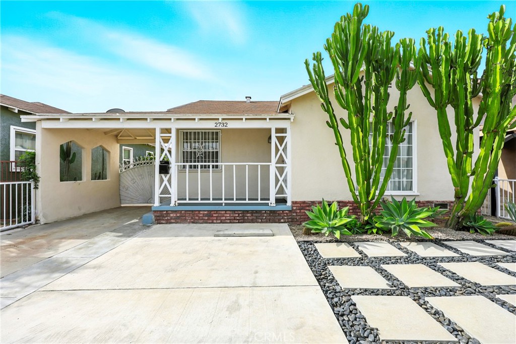Welcome to your New Home at 2732 Indiana Ave! This charming 2-bedroom, 1-bathroom home boasts of comfort and style. It's move-in-ready, filled with natural light, and features: tile flooring throughout, a spacious living room, a dedicated dining area, and a modern kitchen complete with granite countertops, plenty of cabinet space, stainless-steel appliances, and an indoor laundry space. The bathroom is a standout, offering both a bathtub and a separate walk-in shower, providing convenience and luxury in one. The bedrooms are large and airy, creating a bright and inviting atmosphere throughout the home. Recent upgrades also include newer exterior paint and a PVC sewer line. Step outside to enjoy the ample gated parking and a detached oversized 2-car garage that offers excellent ADU potential for added living space, a rental unit, or a home office. There's even additional yard space behind the garage, offering more room to expand or enjoy outdoor living. The low-maintenance landscaping makes upkeep a breeze, and the home is ideally located just minutes from South Gate Park, groceries, restaurants, schools, and major freeways, making daily life incredibly convenient. Perfect Home all year round, come and see for yourself!