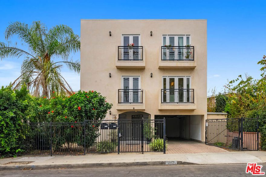 Immerse yourself in the ultimate Hollywood lifestyle with this bright and sophisticated residence, ideally located in the heart of the city. Flooded with natural light from expansive windows, this spacious home boasts sleek modern finishes and statement chandeliers that add a touch of elegance. The open-concept layout seamlessly integrates the stylish kitchen with the living and dining areas, perfect for entertaining. Unwind in the luxurious primary suite, featuring an large walk-in closet and a private balcony for your morning coffee or evening retreat. With an in-unit washer and dryer for added convenience, this stunning Hollywood gem offers the perfect blend of style, comfort, and functionality. Don't miss your chance to call this exceptional property home!