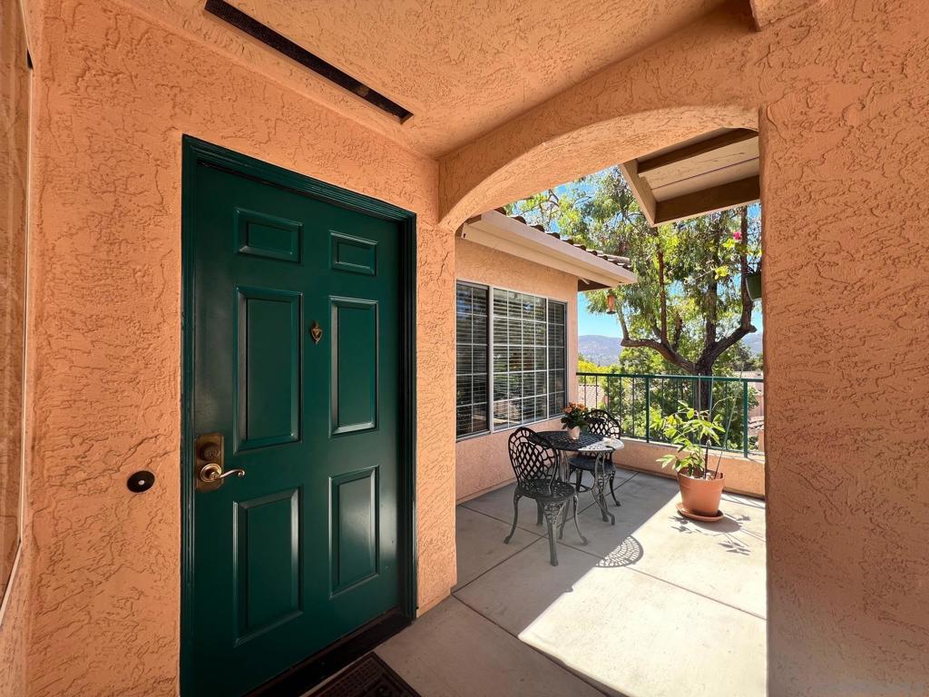 Incredible mountain & sunset views from every room! Top floor single level corner unit at desirable gated Morada at Vista Del Lago! Spacious floor plan with lots of natural light & wood laminate flooring! Beautiful kitchen features granite counters & light colored cabinetry. Good sized dining area & open living room with cheery fireplace. Full Sized washer/dryer in unit. A/C! Serene private patio to enjoy your amazing views! 1 detached garage (G-258). Fabulous RESORT STYLE amenities include: 2 large pools, 2 spas, fitness center, tennis courts, playground, & clubhouse. Very easy freeway access! Coveted Poway Unified School District!