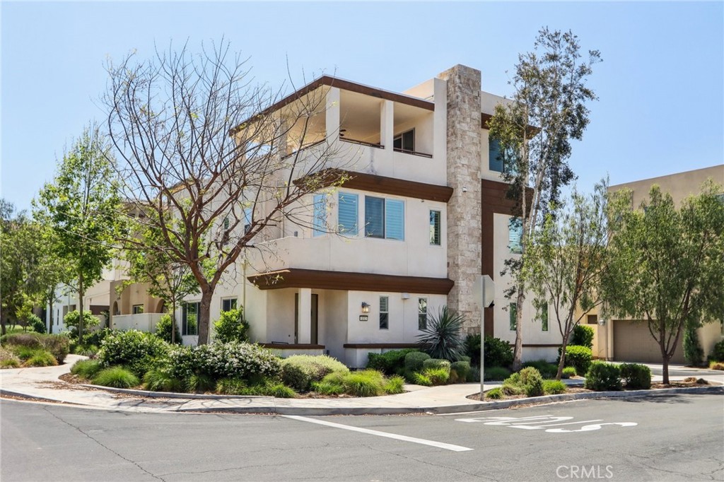 A Move-In Ready Gem in the Heart of Irvine! Step into luxury living in this beautifully maintained 3-bedroom, 2 full bath, 2 half bath single-family home, ideally located in Irvine’s sought-after Great Park Neighborhood and currently for sale or lease. Unlike many homes in the area, this floor plan offers main living and entertaining spaces right on the first floor so no stairs needed to enjoy your daily routines. Built with quality and comfort in mind, the home features an open-concept layout, upgraded flooring, and abundant natural light throughout. The gourmet kitchen is a chef’s dream, complete with stainless steel appliances, quartz countertops, and a spacious island perfect for entertaining or casual family meals. The living area opens to a private outdoor patio with indoor and outdoor areas, offering the ideal space for relaxing or hosting guests. Upstairs, you’ll find a spacious primary suite with a spa-inspired bathroom, dual vanities, a large walk-in closet, as well as generous secondary bedrooms with ample storage. A dedicated laundry room adds everyday convenience, and the attached two-car garage ensures easy parking and extra space. One of the home’s standout features is the covered third-floor deck, a serene retreat with unobstructed mountain views. Whether you're enjoying a quiet morning coffee or gathering with friends, this elevated outdoor space offers fresh air and scenic beauty in total privacy. Residents of this vibrant community enjoy access to award-winning Irvine schools, resort-style amenities including pools, parks, trails, and sports courts. Nearby attractions include the expansive Orange County Great Park, featuring the iconic Great Park Balloon, a carousel, farmers market, and sports fields. For shopping and dining, Woodbury Town Center and Irvine Spectrum Center offer a variety of options just minutes away.