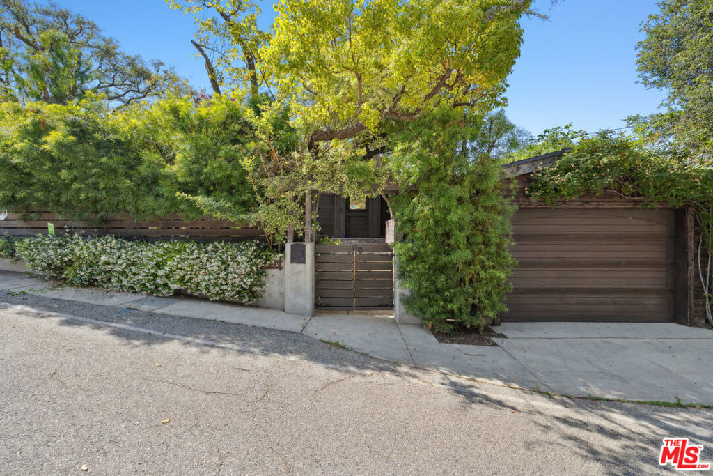 This beautifully presented home offers modern comforts expressed in a seamless blend of charm & style in a quiet, cul de sac location. Open floor-plan with spacious rooms that perfectly flow for entertaining and capturing natural light throughout the day. The gourmet kitchen features a Viking range & Sub Zero appliances, hand crafted Douglas Fir cabinetry & granite counter tops as well as a cozy breakfast nook. Vaulted living room, with beautiful built in entertainment center & bookshelves showcases exceptional craftsmanship, by local Topanga craftsmen that opens to newly finished decks which capture the stunning canyon views that can be enjoyed from the sparkling hot tub. Incredible curb appeal is highlighted by lush landscaping and a one car garage. The attention to detail and pride of ownership is evident throughout this home from the moment you arrive. Vacant and available for immidiate occupancy.
