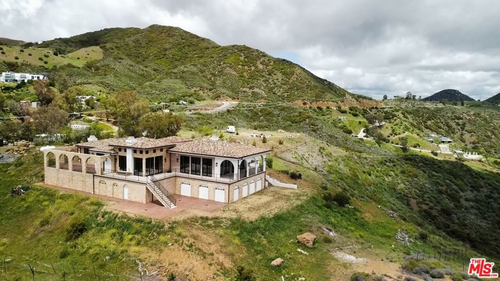 Photo of 33182 Mulholland Highway, Malibu, CA 90265 (MLS # 25531221)