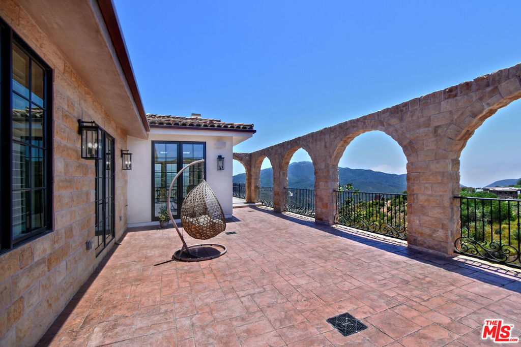 Welcome to the Luxury Malibu Crown Vineyard Estate, brand new construction with over 5300 interior square feet of living on 480,157 square foot (11acre lot). No expense was spared in building this home, with amenities that include three prime suites with three attached baths and one half bath. A chef's inspired kitchen with a center island that seat 14 people. The vineyard is approved for three acres of grapes and has two water wells that are producing up to 70 gallons a minute with tanks that can hold up to 20,000 gallons of water. The downstairs is over 2800 square feet of undeveloped space ready for the new owner to build it out to their desired dreams and can be made into more beds and baths, movie theater, recording studio, or any creative space that the new owner has in mind. This home is ideal for entertainers, winemakers, creatives and luxury buyers. Construction just completed June 2025 and is ready for the new owners to put their finishing touches on it and make it their own. The Seller owns the property next door with 8 acres and is willing to entertain offers for that property as well so new owners could have almost 20 acres of total land as well as permits to build another home next door. Lots of creative options for the right buyers as well as many creative ways to continue to develop the property as well. The Malibu Crown Vineyards name as well as cases of the 2017 & 2018 produced wine will come with the sale of the property. Come see this amazing property and experience first hand all the possibilities that this Vineyard has to deliver.